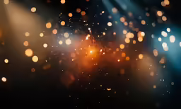 blurry lights against dark background, one is out