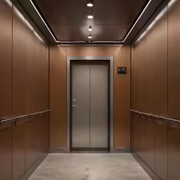 a couple of silver doors in a room