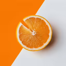 two halves of an orange are next to each other