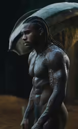 a man in mud with an umbrella in his hand