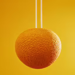 a orange hanging from two wooden skewers