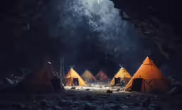 a group of teepees next to each other in the woods