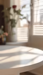 the white table is sitting alone in the sun