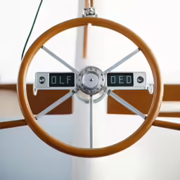 a car steering wheel with a digital display in it