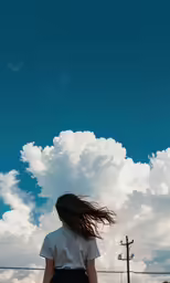 a person that is walking in the grass