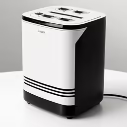 a black and white compact device sitting on top of a table