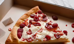 a slice of strawberry pizza is shown in its box