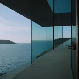 a long stretch of cement walk next to water