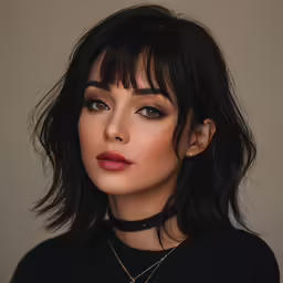 a woman with black hair and a choker on her neck