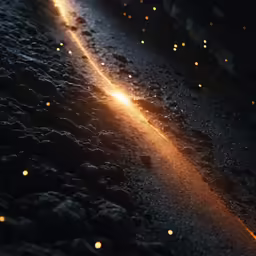 an outdoor area filled with lots of lights and pebbles