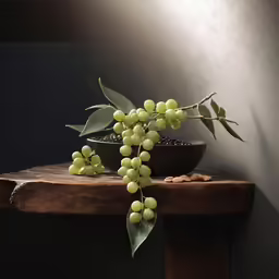 some grapes are sitting on a small wooden table