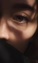 the eyes are looking straight ahead on a woman