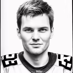 a black and white photo of a young man