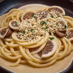 an image of food with oranges and mushrooms