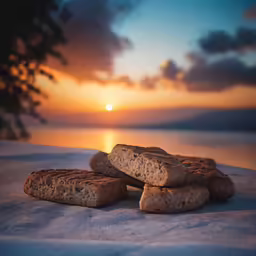 three uncut breads sit next to each other