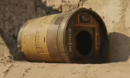 the old barrel is right on top of the wall