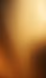 a gold wall with a shiny surface and a blue base