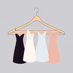 four dresses hang on a clothes rack, in an abstract manner