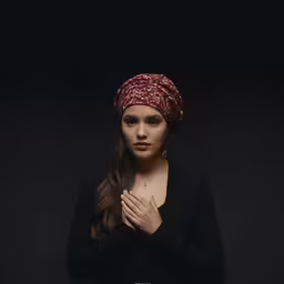a beautiful woman with a red bandana on her head