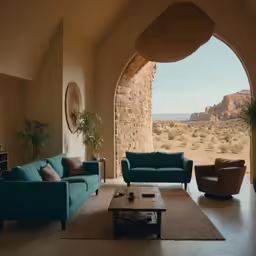 living room with large windows and desert landscape view