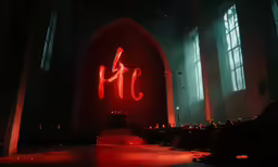 a large church filled with lots of pews and glowing signs