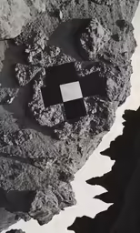 a rock has been converted into a black and white photo
