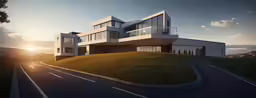 a modern home sits on the side of a hill at sunset