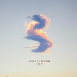 clouds are billowing in the sky, creating a caption