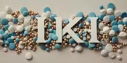 the letters i kl above a lot of different type of candy