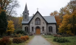 an image of a very big church with trees in the background