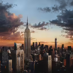 a city skyline with many tall buildings under a cloudy sky