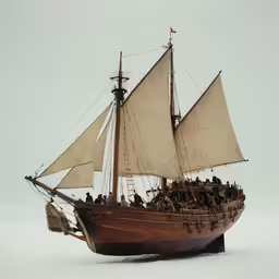 the toy boat is sitting on a shelf