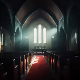 a church filled with lots of wooden pews