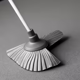 an image of a brush with a white handle