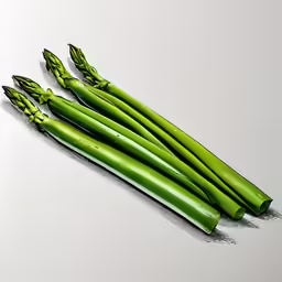 the vegetable is green with thin stalklets
