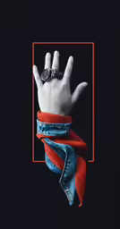 the image of a hand wrapped in bandanna