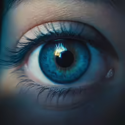 an eye that is open with blue eyes