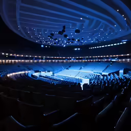 there is an empty concert auditorium at night