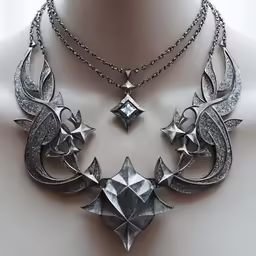 this intricately designed necklace has three pieces of silver on a chain