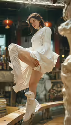 a woman posing in white clothes leaning on a statue