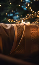 a candle is lit next to some wrappings