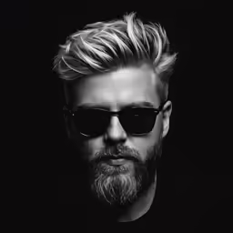 a black and white photo of a man with sunglasses