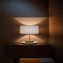a lit up table with a lamp on it