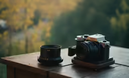 a camera sitting on top of a wooden table