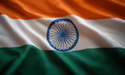 the indian flag with a large wheel on top of it