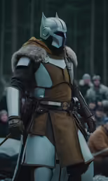 the knight in a full costume and armor stands in front of an audience
