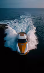 the small boat is moving quickly through the water