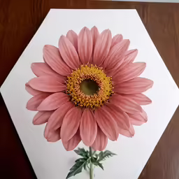 a picture of a large flower on a table