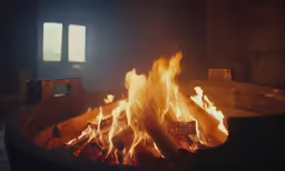 a fire is coming out of the pot to heat