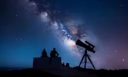 three people are standing on a platform under a star filled sky